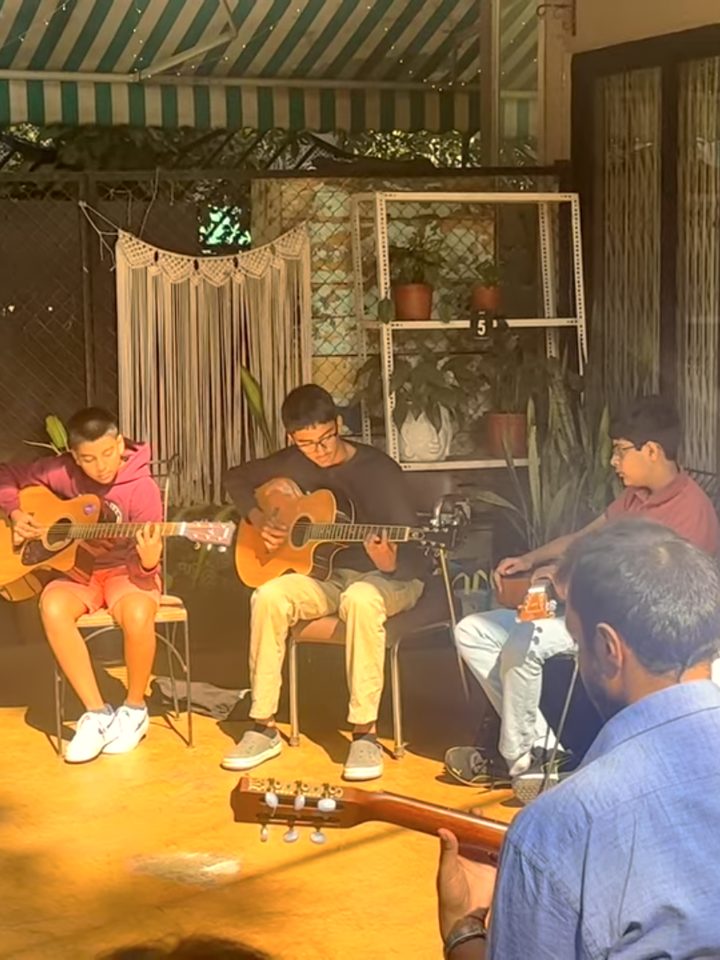 Students playing together at a recording and performance session